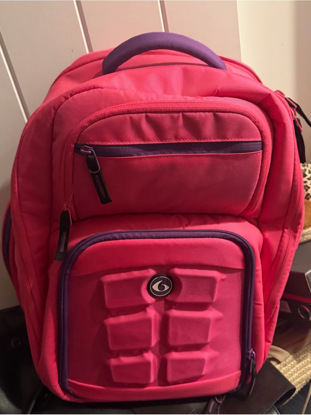 Travel Fit Pink Daypack with Purple Tag
